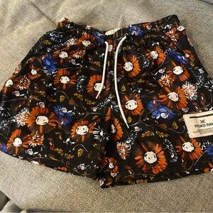 Labeled as Ryoko Size L Floral Print Active Athletic Mesh Shorts.